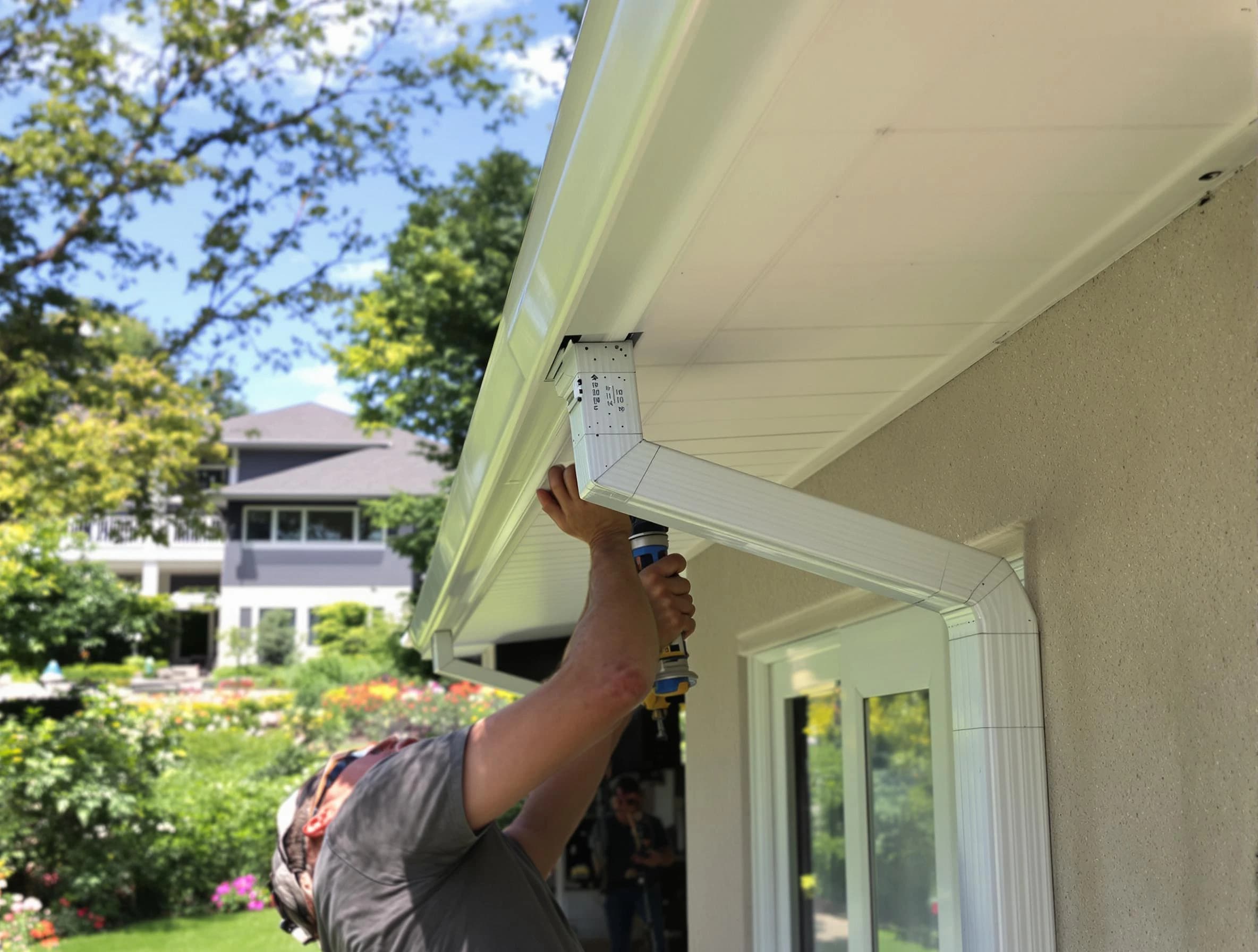 Akron Roofing Company technicians performing gutter installation in Akron, OH