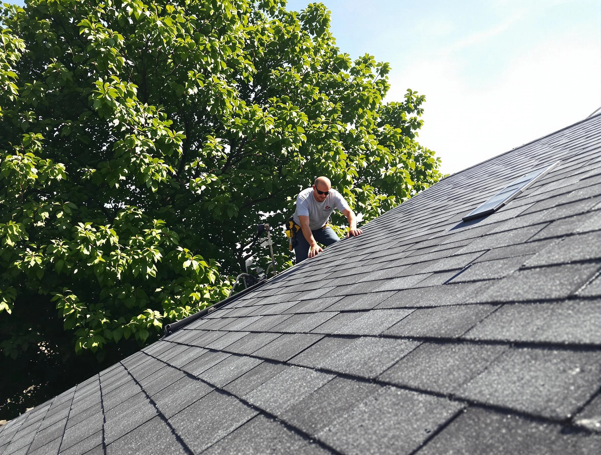 Certified roofers from Akron Roofing Company working in Akron, OH